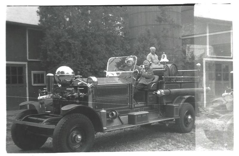 Could possibly the first female driver :) No information found on photo.